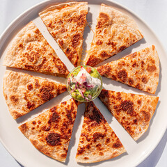 mexican quesadilla with chicken cheese guacamole and pico de gallo