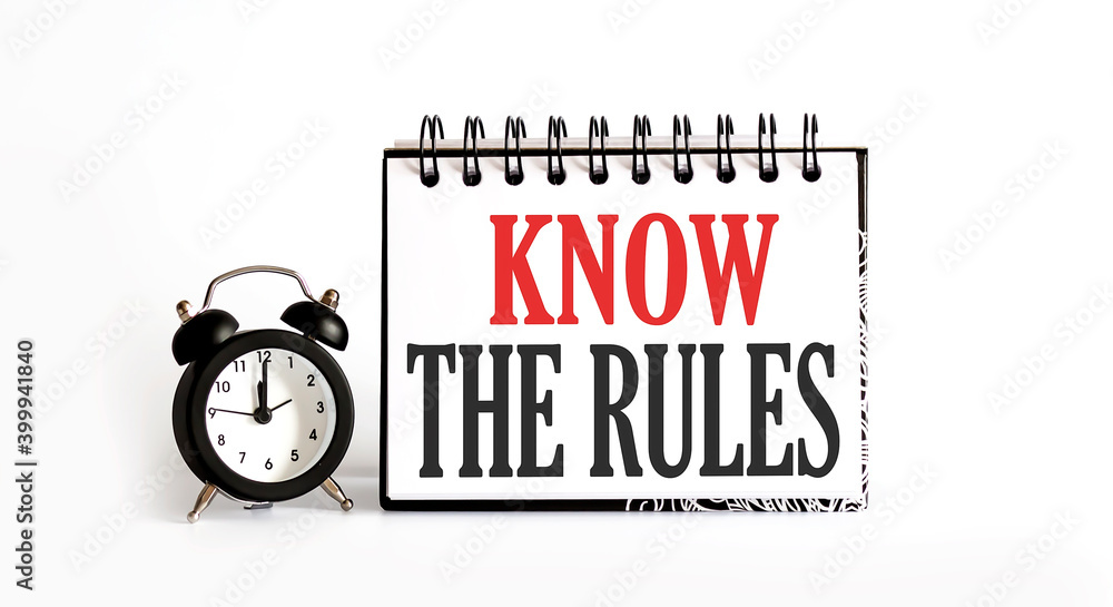 Aufkleber know the rules notepad writing on the white background with alarm clock