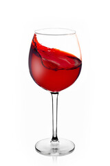 Glass glass with red wine with a splash on a white background