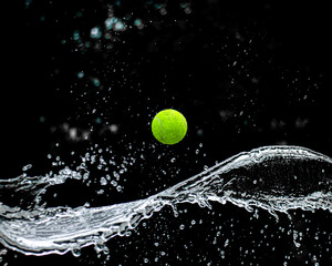 tennis ball in water splash