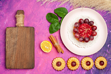 top view little cookies with cake on pink background sweet biscuits cake dessert