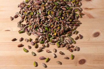 pistachios on wood  background