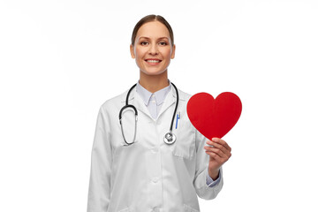 medicine, healthcare and cardiology concept - smiling female doctor with red heart and stethoscope