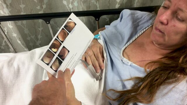 Female patient discussing results after a medical procedure with her doctor
