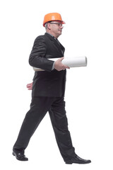 Businessman in wearing hard hat holding documents