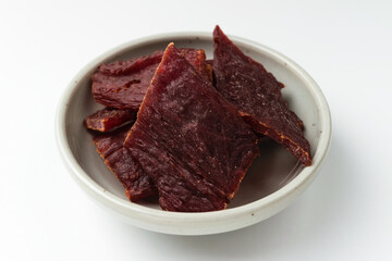 Beef jerky on white background