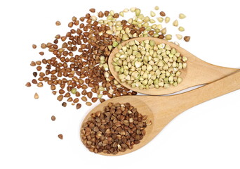 Buckwheat seeds with wooden spoon isolated on white background, top view