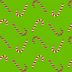 Seamless Christmas pattern with candy canes. Hand painted watercolor illustration on green background