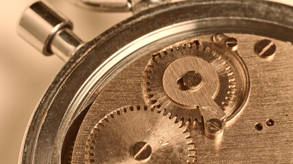 Fototapeta na wymiar fragment of the mechanism of a mechanical sports stopwatch, close-up