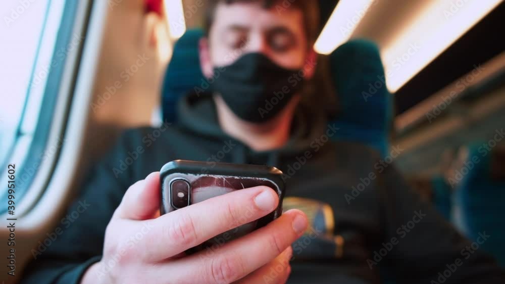 Poster communication of a person in travel. using the mobile application. a man uses a mobile phone in a tr