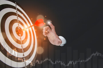 Targeting the business concept, Businessman throwing red arrow dart to virtual target dart...