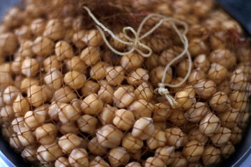 Boiled chickpeas in a net