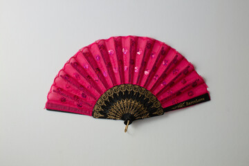 red spanish fan on white background