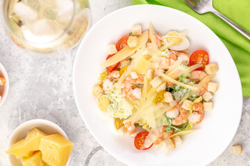 Shrimp salad with fresh vegetables, cheese and croutons.