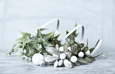 Christmas decoration. Bright wooden background. Close up.