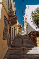 Narrow alleyway in with stairs in Ermoupolis on the Greek island of Syros, Greece