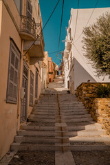 Narrow alleyway in with stairs in the old town of Ermoupolis on the Greek island of Syros - Cyclades, Greece