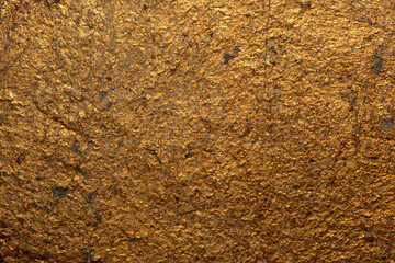 Fake gold yellow texture abstract wall background and gradients shadow shiny