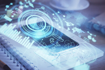Double exposure of financial theme drawing and cell phone background. Concept of business