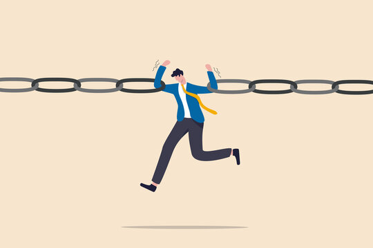 Business risk, vulnerability, danger and weakness or conflict causing failure in business and investment concept, tried fatigue businessman trying to hold broken chain together with his low energy.