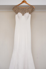 wedding dress on a hanger