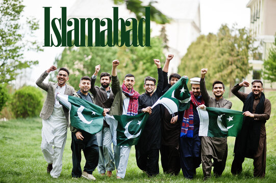 Islamabad city. Group of pakistani man wearing traditional clothes with national flags. Biggest cities of Pakistan concept.
