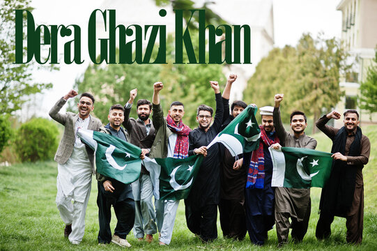 Dera Ghazi Khan city. Group of pakistani man wearing traditional clothes with national flags. Biggest cities of Pakistan concept.