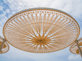 Beach umbrella made of wicker