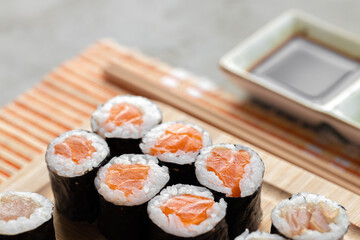 Maki sushi set served on wooden tray