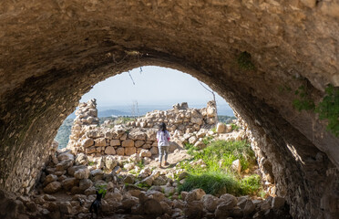 Undefined little girl playing at Crusader's forte at Beit Itab at the Jerusalem Subdistrict