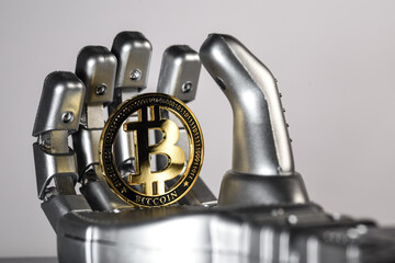 Bitcoin monnaie virtuel cryptomonnaie main robot