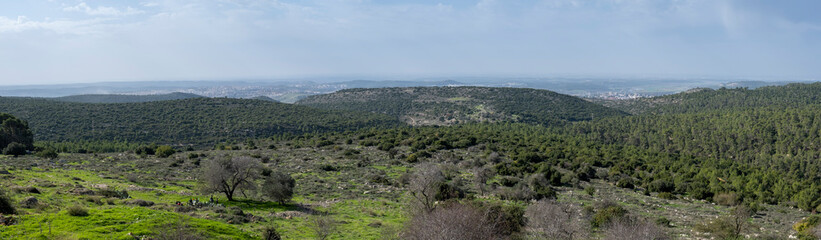 Fototapeta na wymiar Large panoramic view on green hills and Beit Shemesh city in Jerusalem SubDistrict