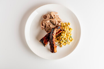 Pork ribs. Barbecue pork ribs served with classic bbq sides Mac n cheese, cornbread, Brussels sprouts, coleslaw & beer. Classic traditional Texas meats & side dishes.