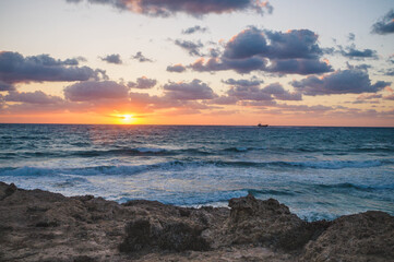Sunset at Paphos, West coast of Cyprus. View on Mediterranean Sea.