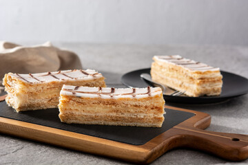 Millefoglie or French mille-feuille on gray stone