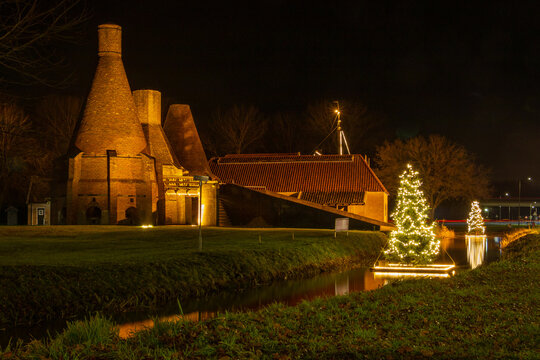 Complete restored lime kiln at night in the December month with a decoration of Christmas lights in  village Dedemsvaart the Netherlands