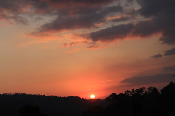 this photo is a photo of silhouettes of trees and beautiful sunsets.