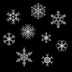 set of snowflakes on black