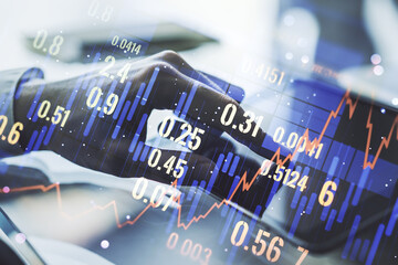 Abstract creative financial graph with finger clicks on a digital tablet on background, forex and investment concept. Multiexposure