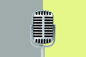 Retro microphone with copy space on color background