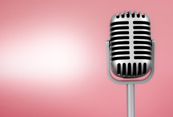 Fototapeta na wymiar Retro microphone with copy space on pink background