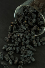 Dried raisins on white background