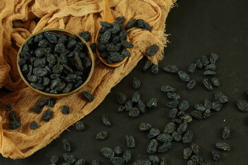 Dried raisins on white background