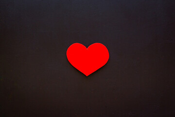 Love concept. Heart made of red paper, top view