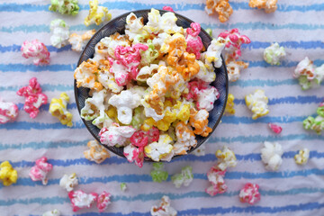  colorful popcorn in a bowl on table cloth