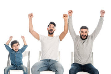 excited hispanic father, granddad and boy showing win gesture and shouting isolated on white, three generations of men