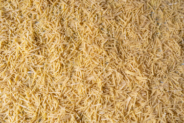 Bowl of traditional Turkish noodle, urkish pasta; noodle. Noodles are the pasta that Turkish women make at home.turkish style homemade thin rod shaped noodles pictures, make pasta with homemade pasta,