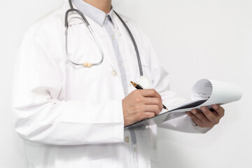 medicine, profession, healthcare and people concept - close up of doctor with clipboard and stethoscope
