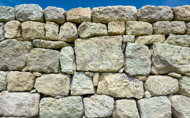 Ancient stone wall in near plan