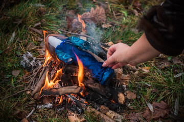 Pagan magic doll at fire, cleaner of negative and other rituals